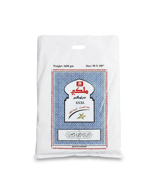 A white plastic bag of cotton bed sheets with a blue, white, and red printed label on the front, set against a plain white background.